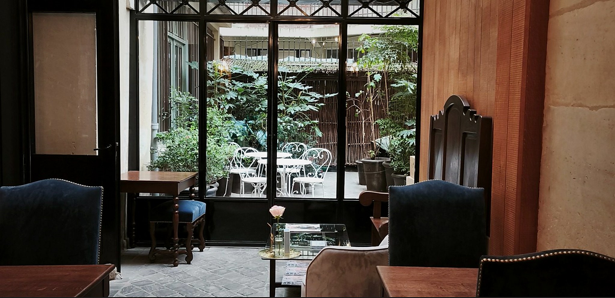 Cour des Vosges courtyard entrance Place des Vosges Paris boutique hotel Marais